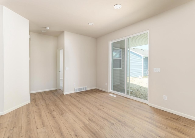 2168 Winding Stream Way, Sun Prairie, WI 53590 - empty room featuring light wood-type flooring and recessed lighting