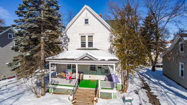 view of front of home featuring covered porch