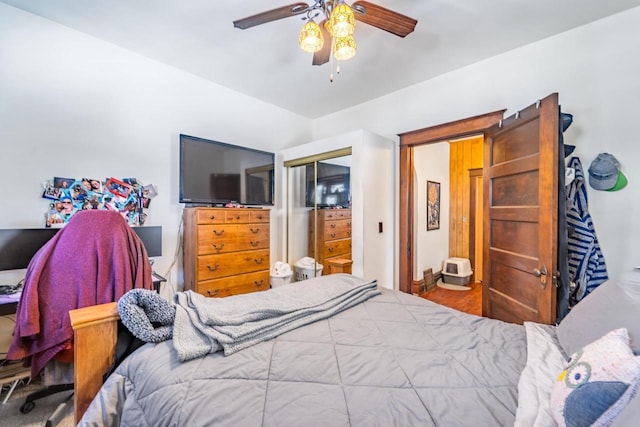 bedroom featuring a ceiling fan and a closet