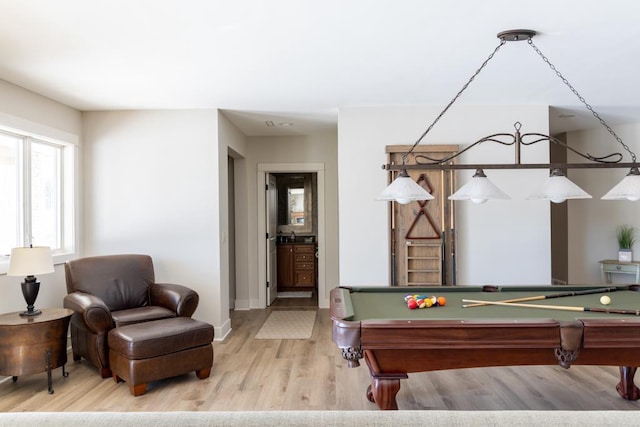 recreation room featuring pool table, wood finished floors, and baseboards