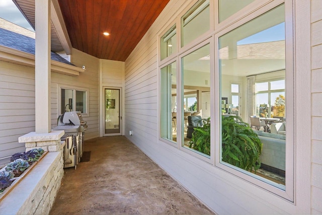 sunroom / solarium with wooden ceiling