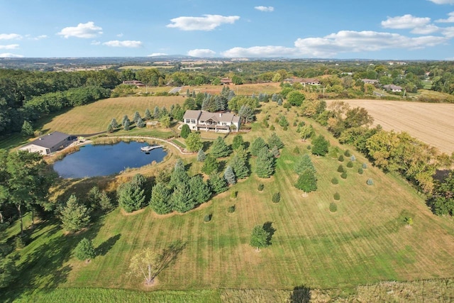 aerial view featuring a rural view and a water view