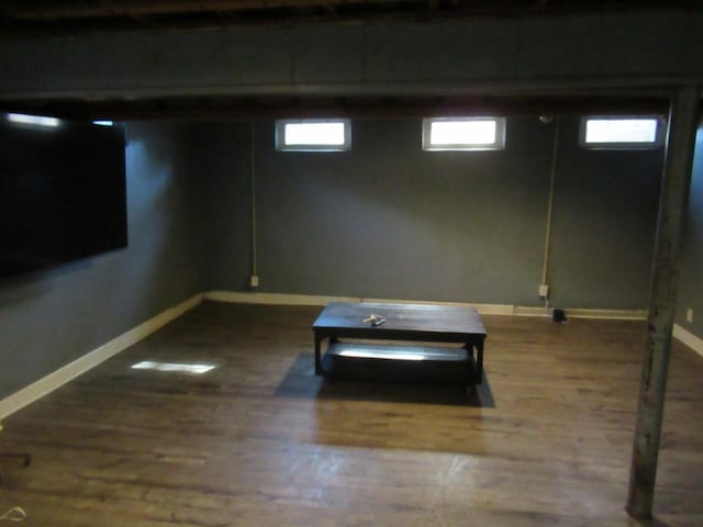 basement with wood finished floors and baseboards