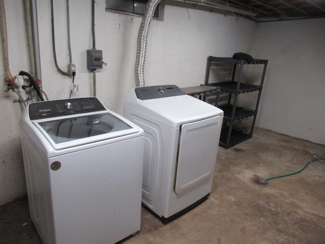 laundry area featuring laundry area and washer and clothes dryer