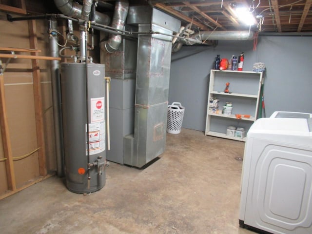 interior space with gas water heater, washing machine and clothes dryer, and heating unit