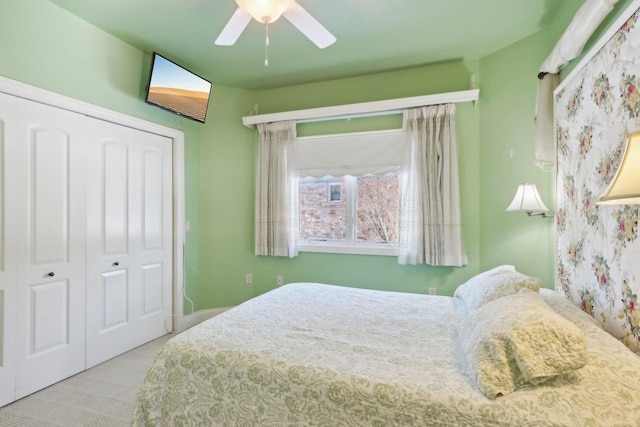 bedroom featuring a closet and a ceiling fan