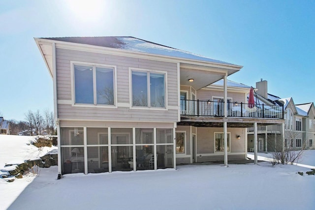 view of snow covered property