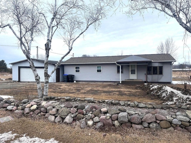 ranch-style house featuring a garage