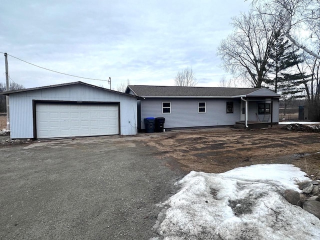 single story home featuring a garage