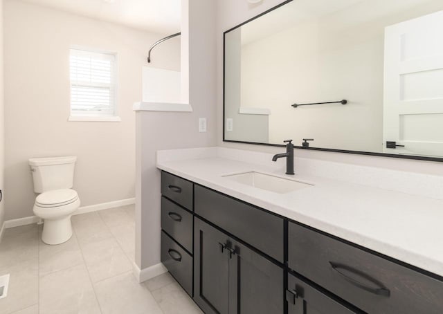 8012 Laufenberg Blvd, Cross Plains, WI 53528 - bathroom with baseboards, toilet, and vanity