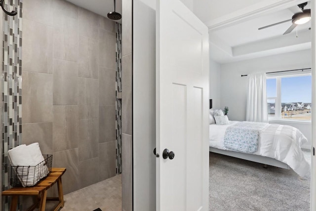 bedroom featuring light carpet and a ceiling fan