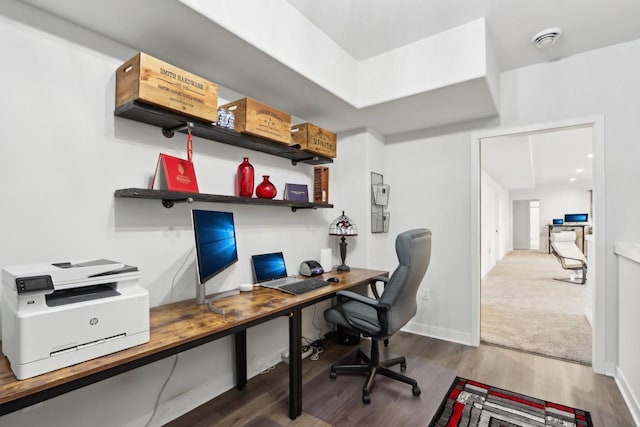 office with baseboards and wood finished floors