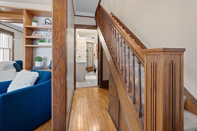 stairway featuring hardwood / wood-style floors