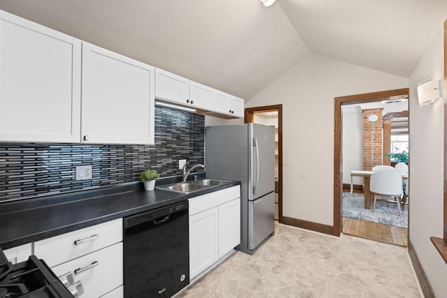 kitchen featuring a sink, dark countertops, white cabinetry, and dishwasher