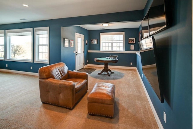 game room with carpet and baseboards