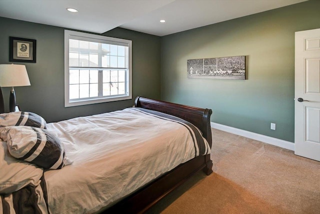 bedroom featuring recessed lighting, carpet flooring, and baseboards