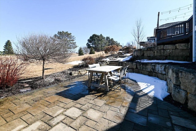 view of patio with outdoor dining area