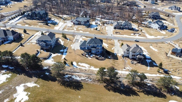 birds eye view of property with a residential view