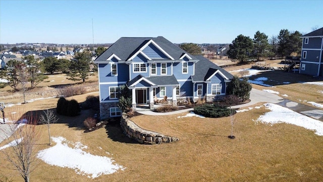 view of front of home with stone siding