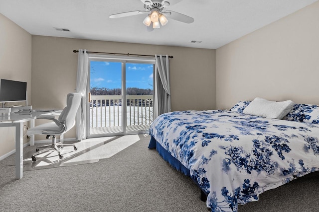 carpeted bedroom featuring ceiling fan, baseboards, visible vents, and access to exterior