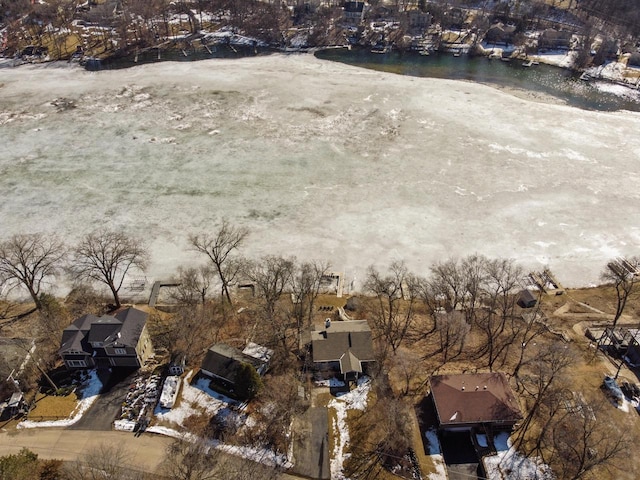 birds eye view of property with a residential view and a water view