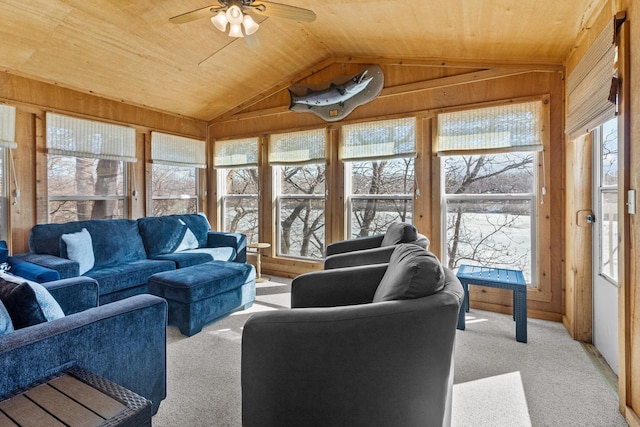 living room with wood ceiling, light carpet, and plenty of natural light