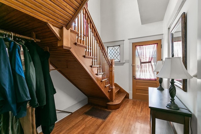355 W Mill St, Columbus, WI 53925 - staircase featuring wood-type flooring and plenty of natural light