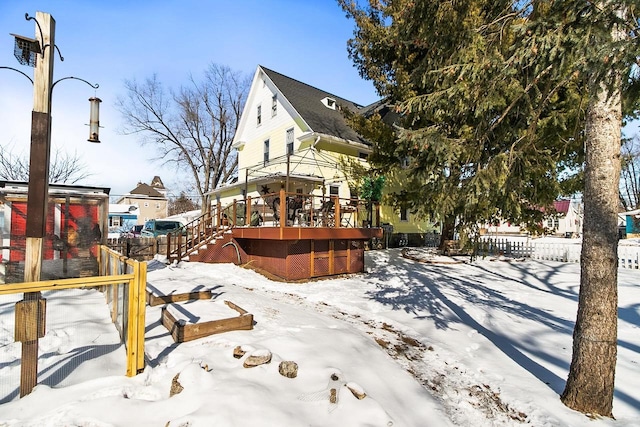 355 W Mill St, Columbus, WI 53925 - snowy yard featuring a deck