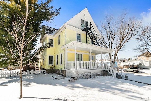 355 W Mill St, Columbus, WI 53925 - view of front of house with a porch and stairway