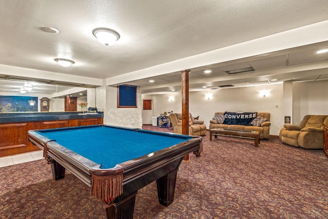 game room with billiards, a textured ceiling, and carpet flooring