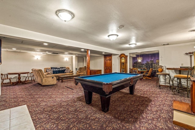 game room with billiards, a textured ceiling, and carpet flooring