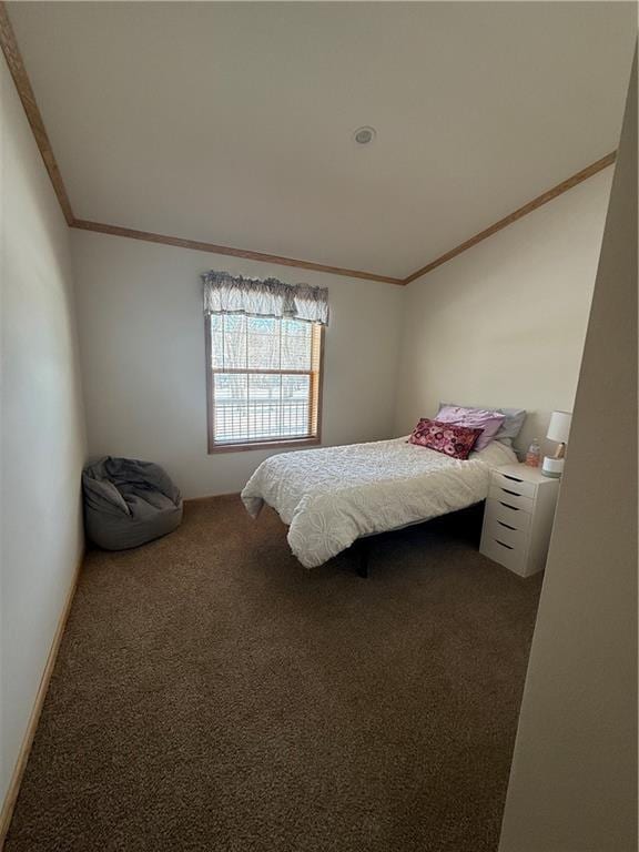 carpeted bedroom featuring crown molding