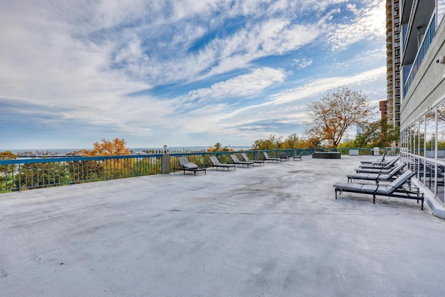 view of patio / terrace featuring a water view