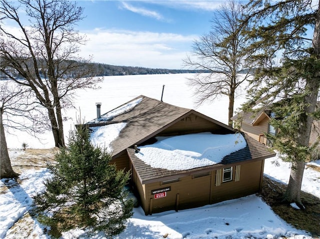 view of snow covered property