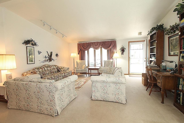 living room with carpet and track lighting