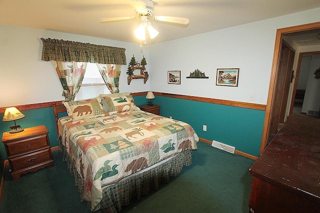 carpeted bedroom with ceiling fan, visible vents, and baseboards