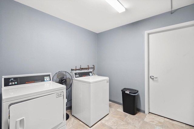 common laundry area with washer and dryer