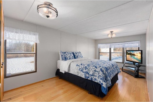 bedroom with light wood-style flooring