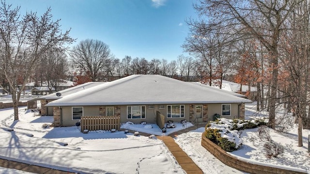 view of snow covered property