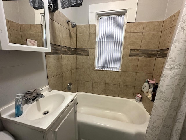 full bath featuring shower / tub combo and vanity