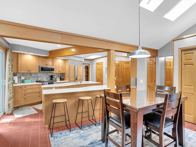 605 S Adams Ave, Marshfield, WI 54449 - dining space with lofted ceiling with skylight