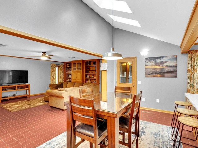 605 S Adams Ave, Marshfield, WI 54449 - dining room featuring a skylight, ceiling fan, baseboards, and tile patterned flooring