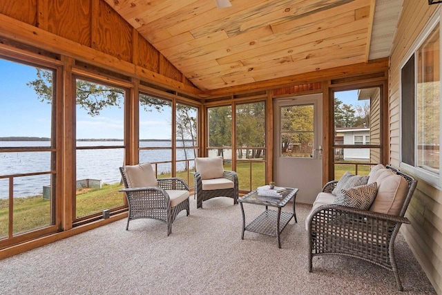 sunroom featuring wood ceiling, a water view, and vaulted ceiling