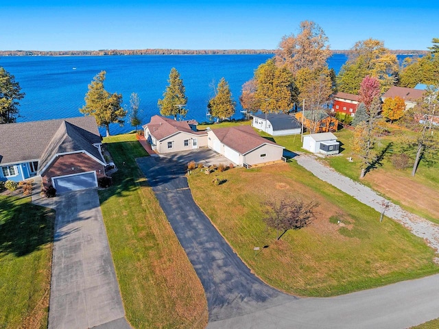 drone / aerial view with a water view