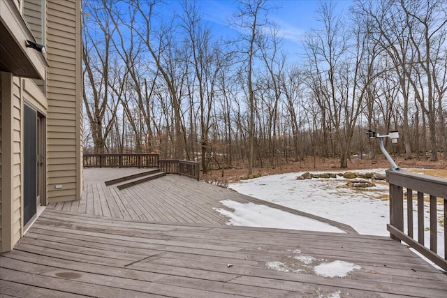 view of snow covered deck