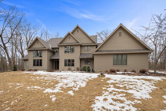 view of front of property with a shingled roof