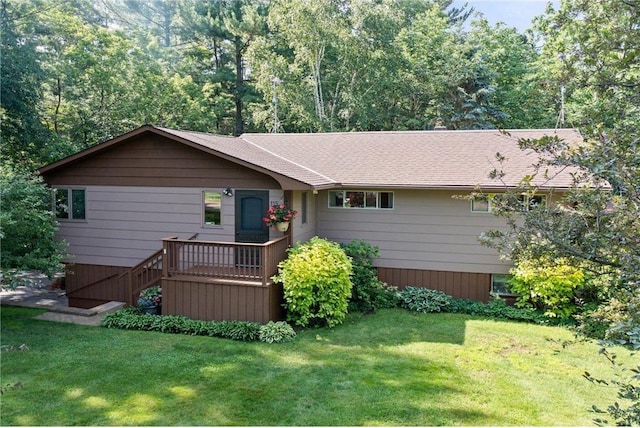 115 Pine Crest Rd, Balsam Lake, WI 54810 - ranch-style house featuring a deck and a front yard