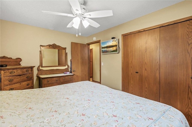 115 Pine Crest Rd, Balsam Lake, WI 54810 - bedroom featuring a textured ceiling, a closet, and a ceiling fan