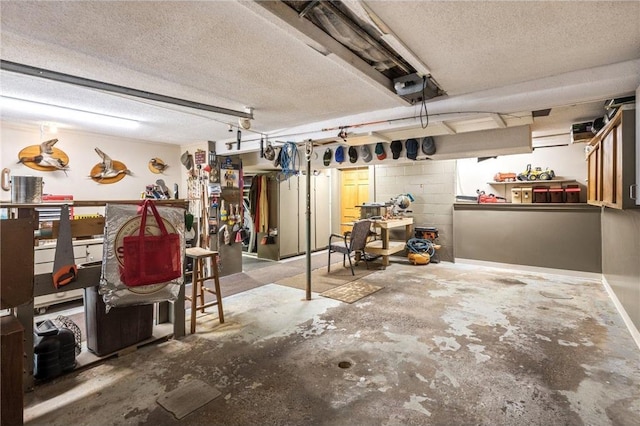 115 Pine Crest Rd, Balsam Lake, WI 54810 - garage with a workshop area and concrete block wall