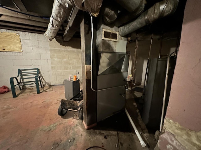 utility room featuring visible vents and heating unit